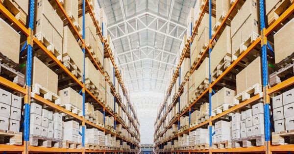 Aisle of boxes in warehouse