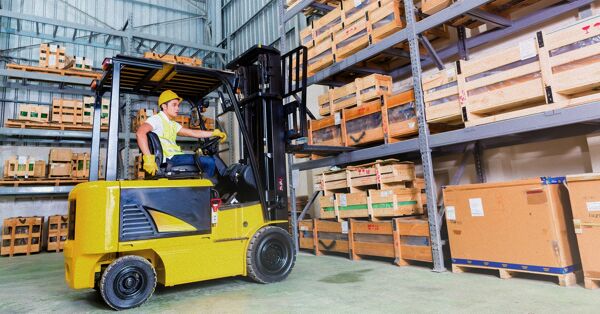 A worker using an industrial equipment