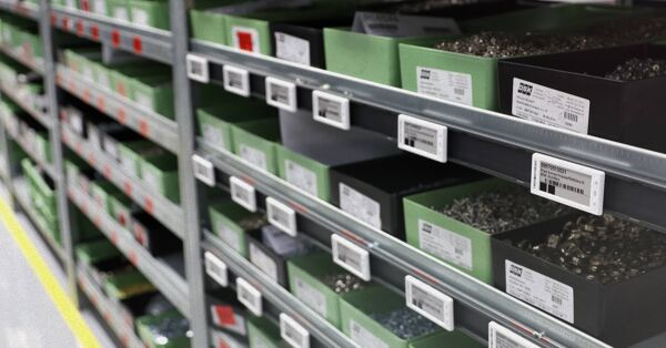 Industrial shelf equipped with multiple SOLUM ESL