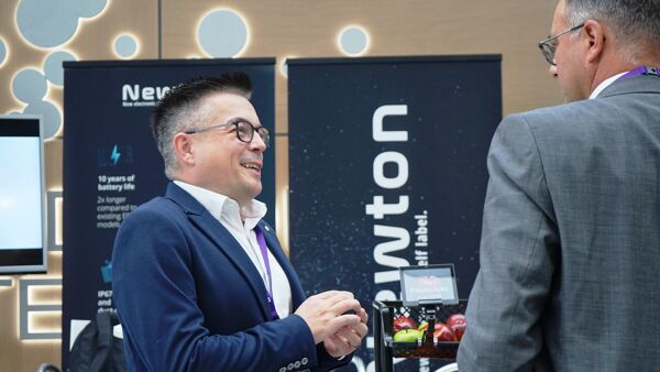  Senior Sales Rep Jochen Goppold, demonstrates Newton Electronic Shelf Labels