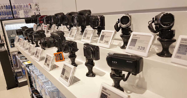 Black and white ESLs on a camera shelf