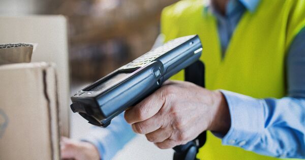 Warehouse Woman Worker with Barcode Scanner