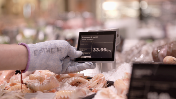 Supermarket Staff using the Electronic shelf label